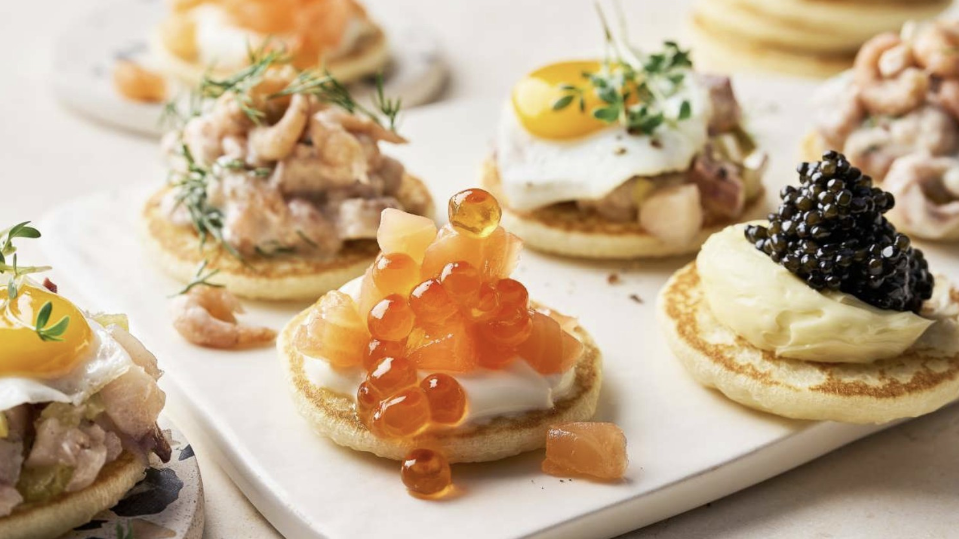 Caviar tapas plate by Santos Gourmet featuring luxurious caviar varieties and elegant tapas-style presentation.